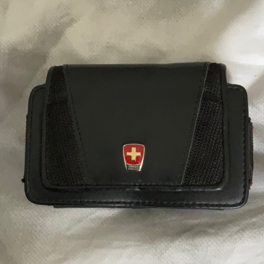 Swiss mobility case. Fits onto belt, and has a loop for a lanyard or strap.